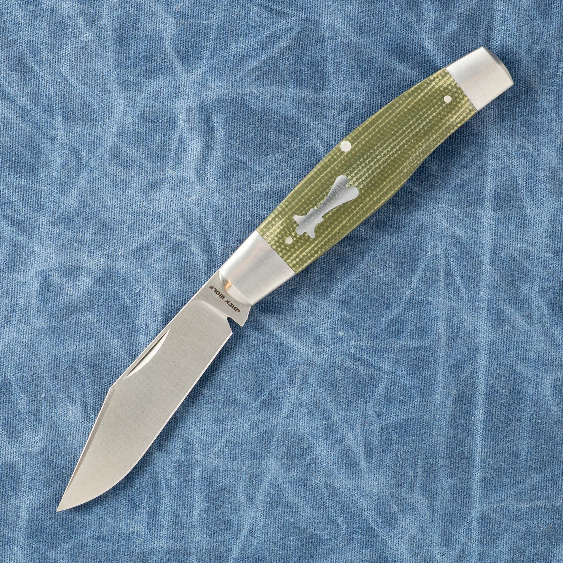 STOCKMAN - GREEN CANVAS MICARTA