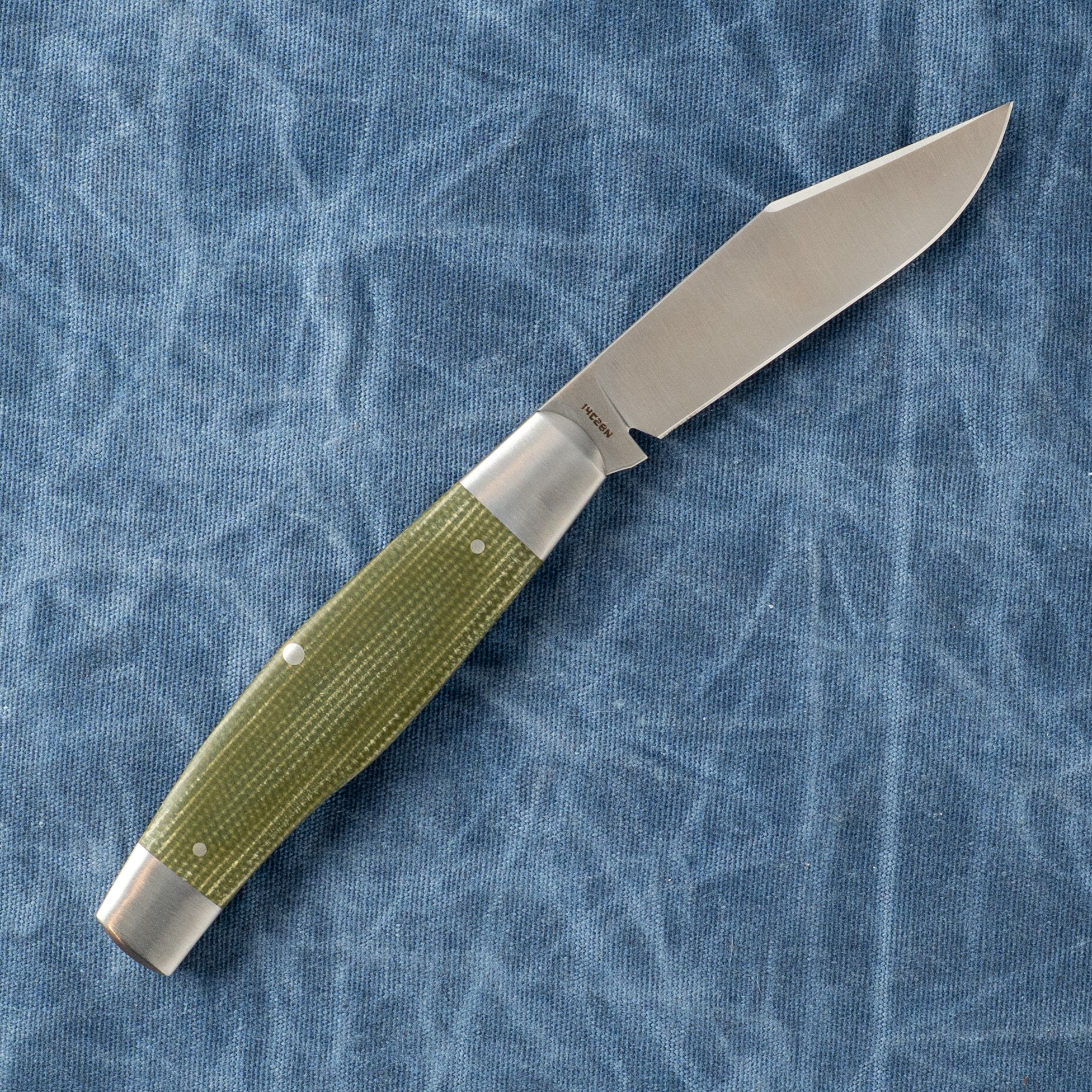 STOCKMAN - GREEN CANVAS MICARTA