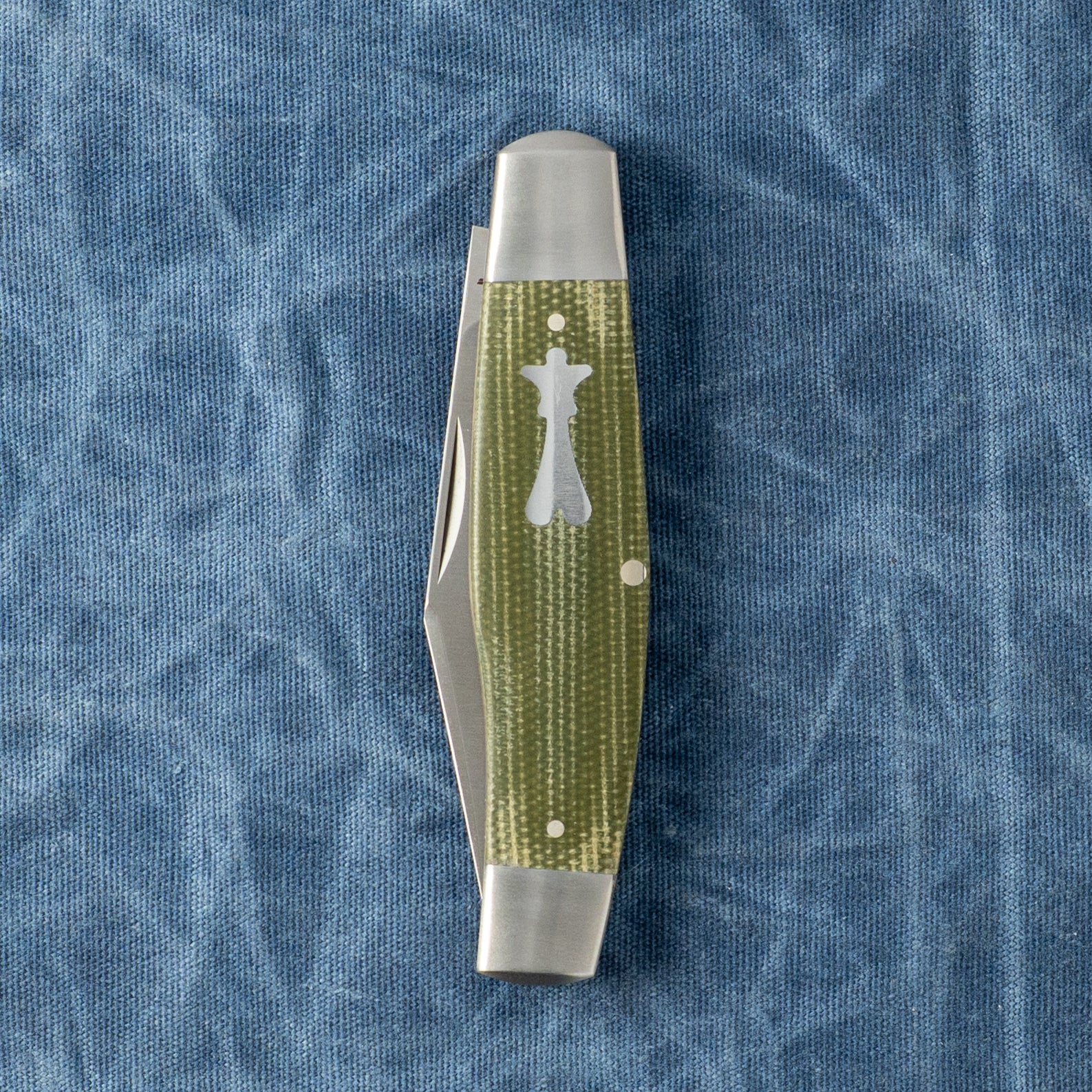 STOCKMAN - GREEN CANVAS MICARTA